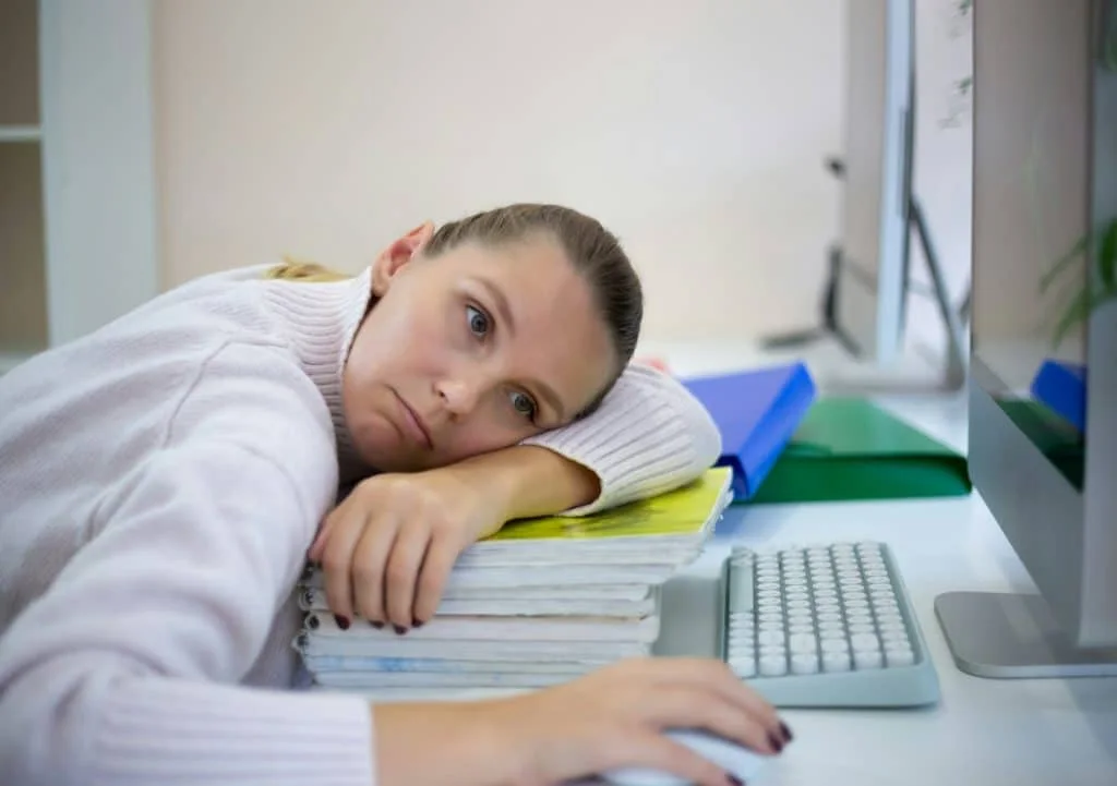 young woman is sad at the workplace. office work concep
