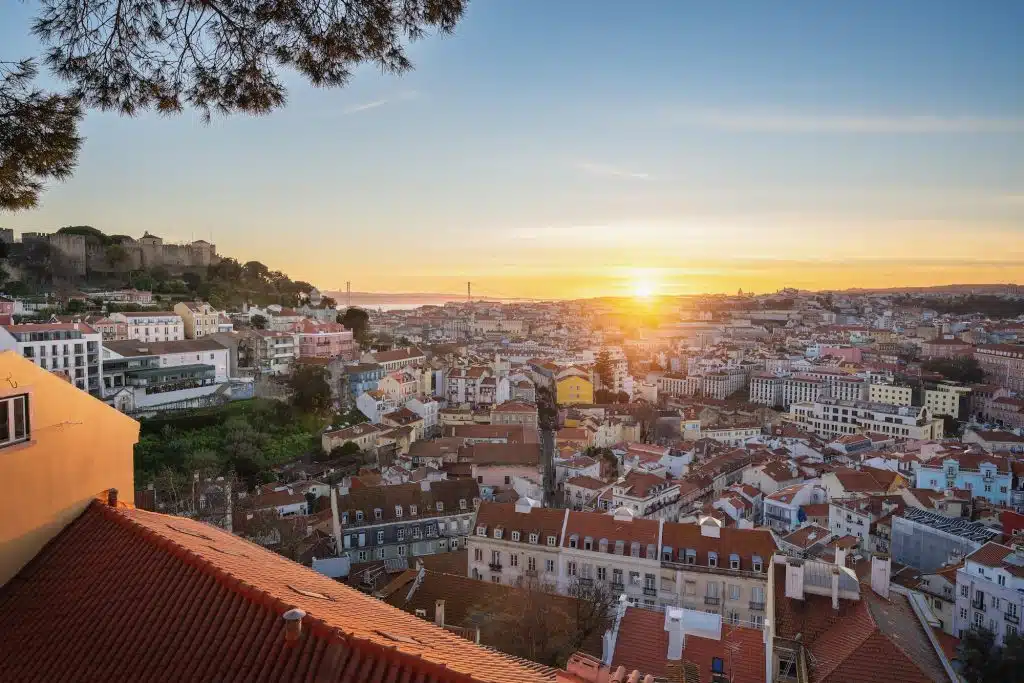 Aerial view of Lisbon at sunset from Miradouro da Graca Viewpoint - Lisbon, Portugal