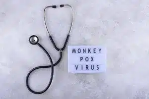 Monkeypox virus concept. Medical desk