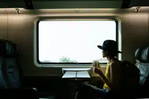 A beautiful hipster asian woman traveling on the train