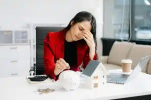 woman hand coins with piggy bank. business finance saving and investment concept.