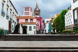 Beautiful view of a square with colorful buildings in Funchal, Madeira