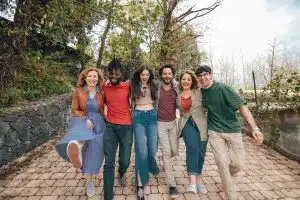 group of happy expats students abroad walking having fun